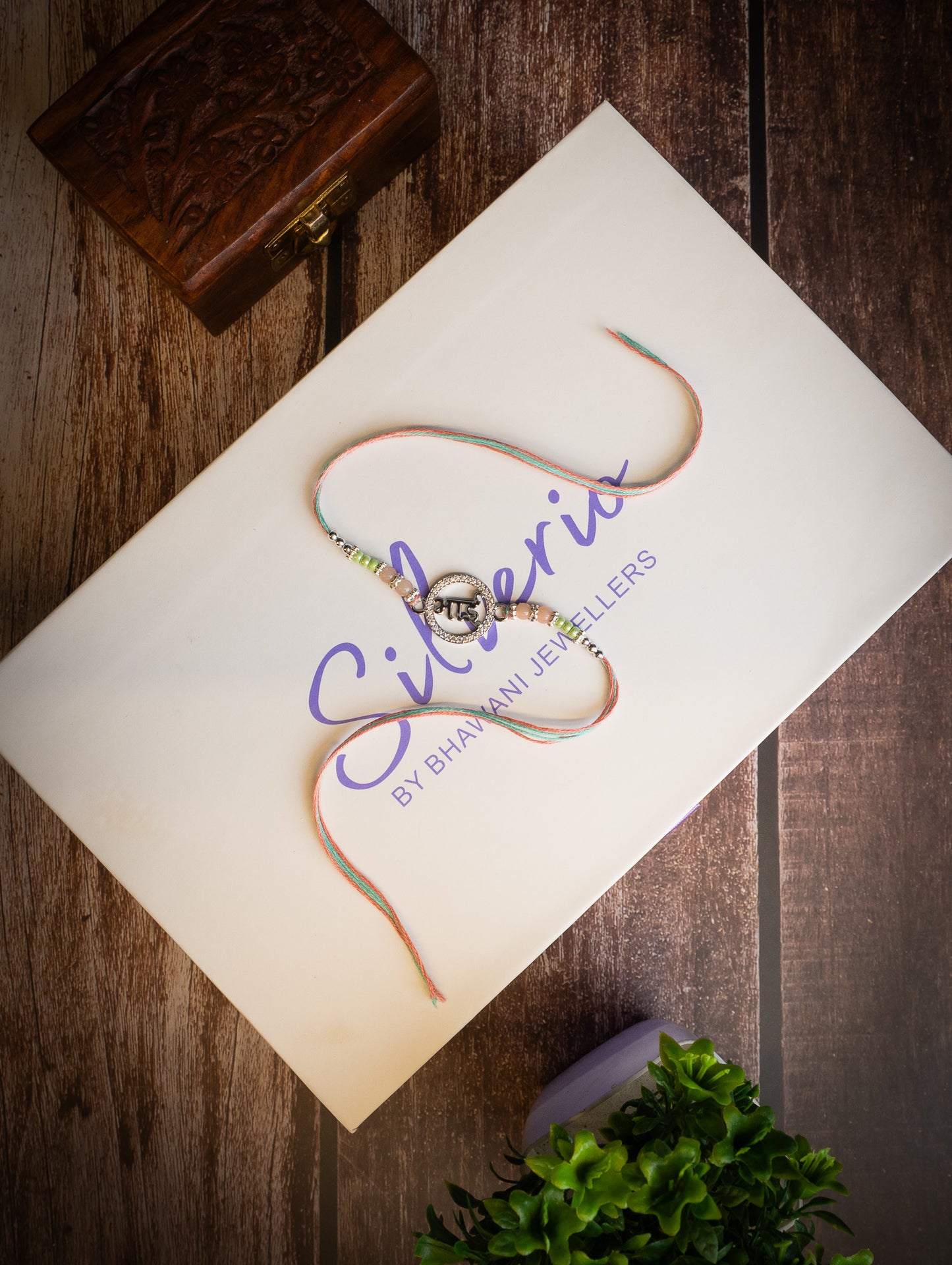 silver rakhi