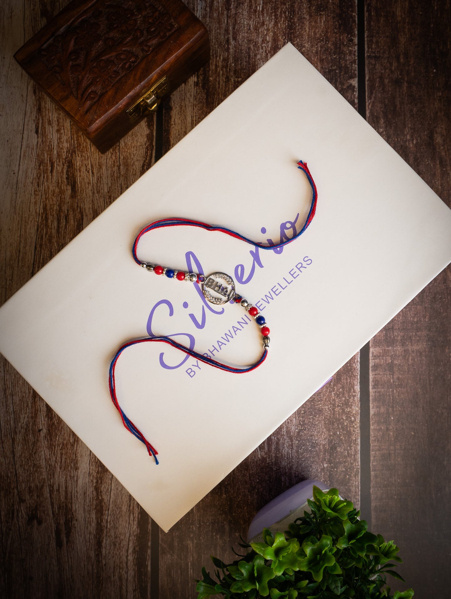 silver rakhi