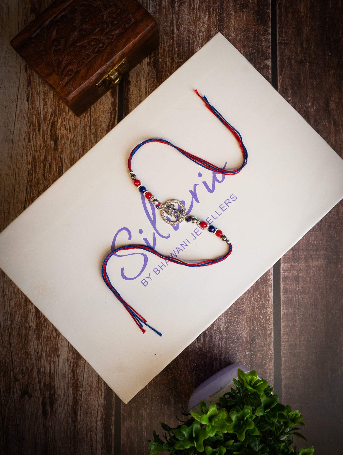 silver rakhi