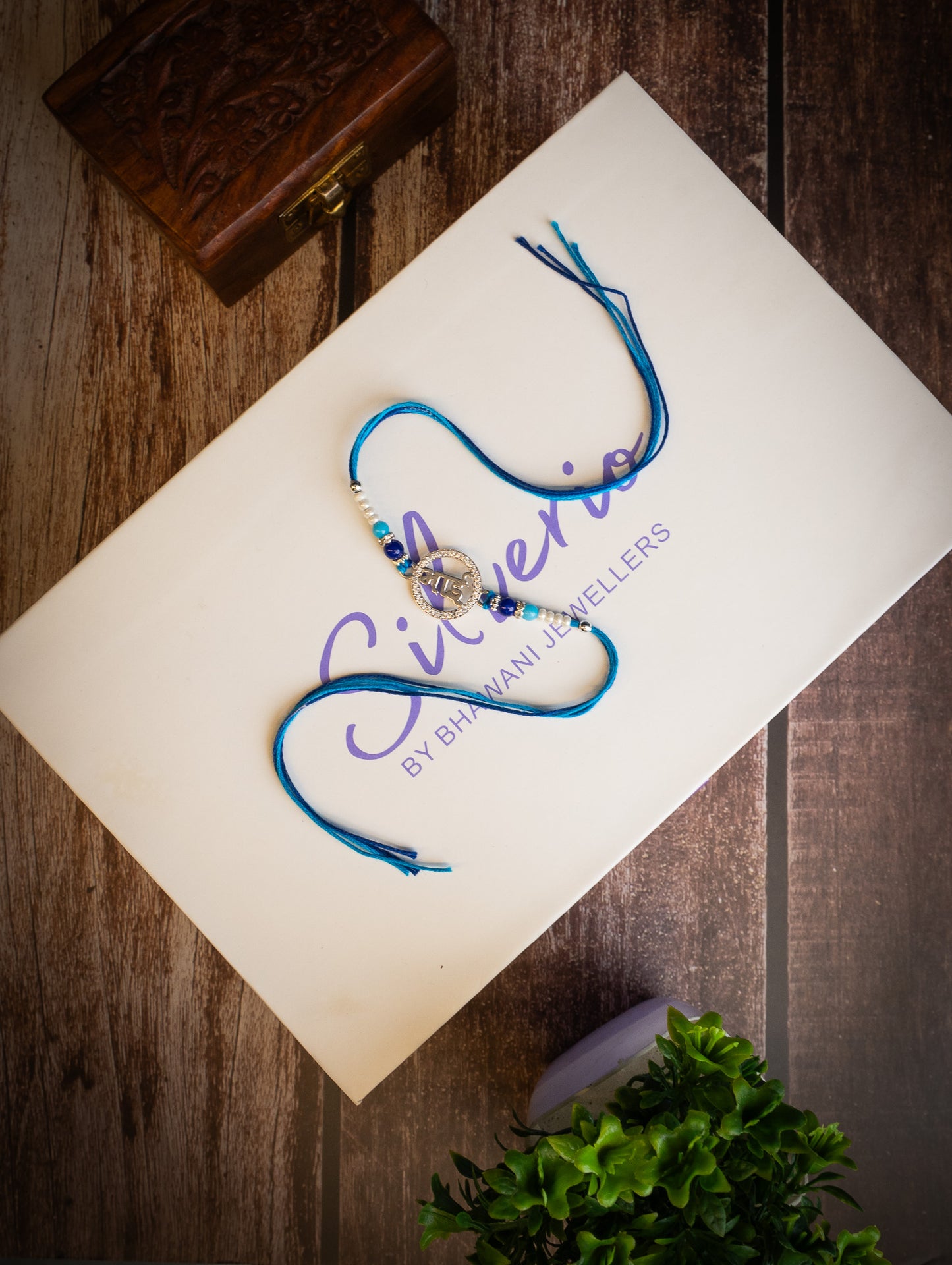 silver rakhi