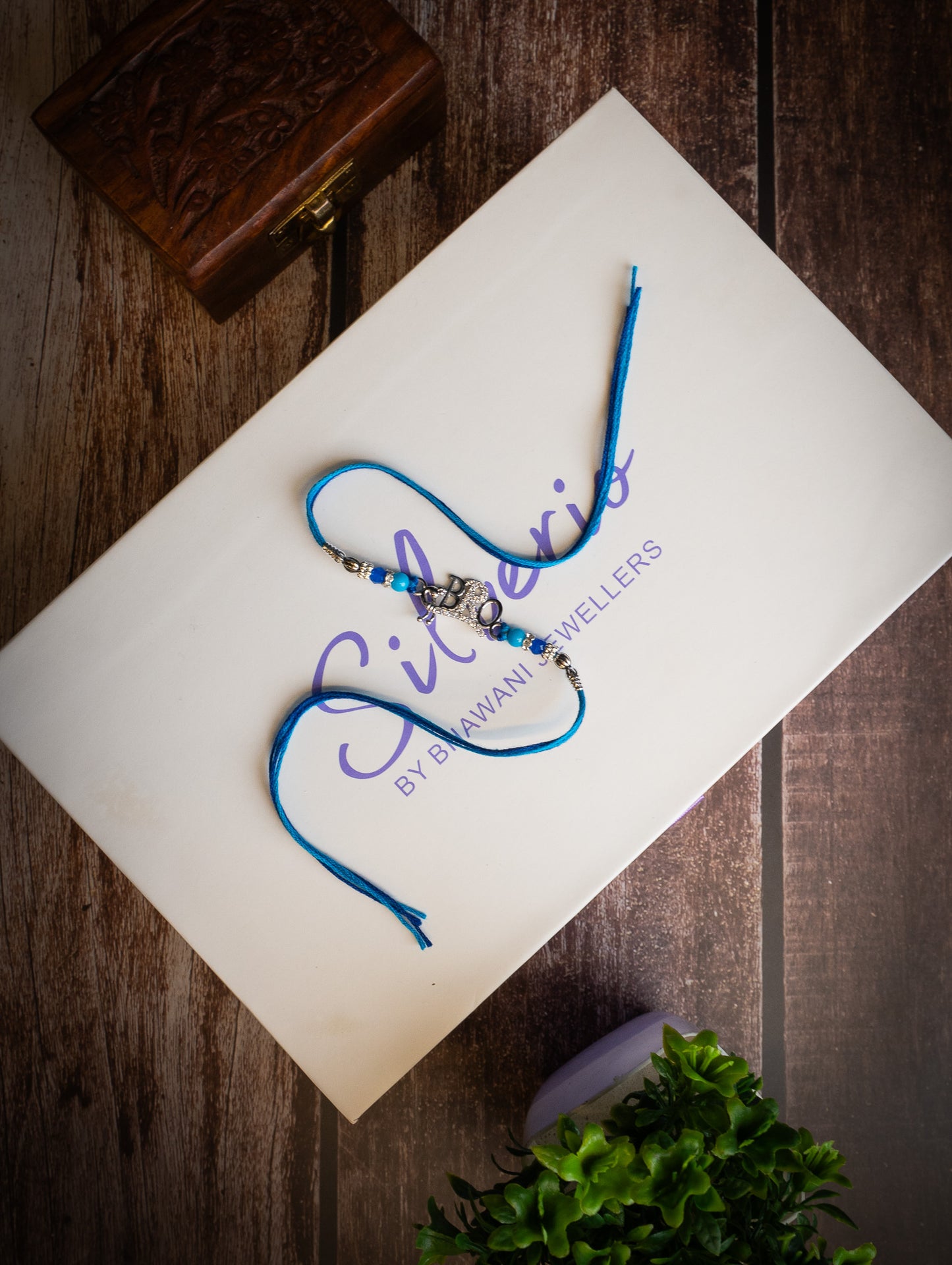 silver rakhi