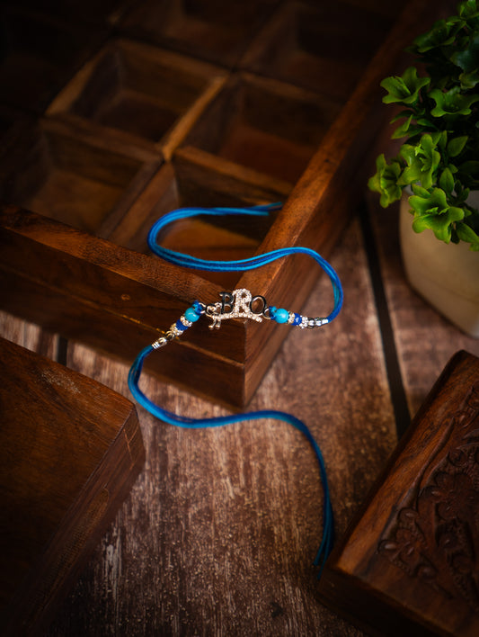 silver rakhi