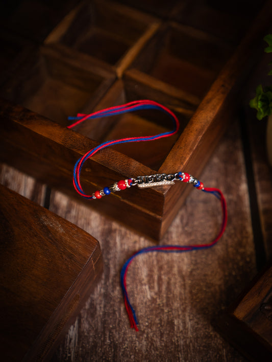 silver rakhi